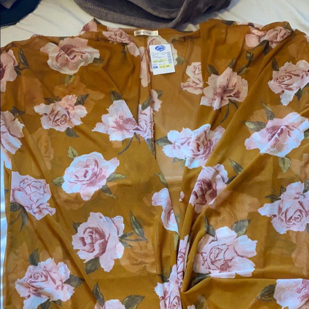 Brand new Kimono beaver worn.